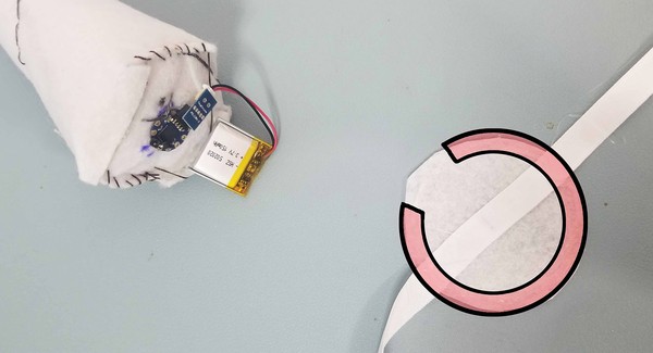 Open ring indicating where hot glue should be placed on Felt Piece B. 