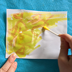 A message written in secret ink being revealed