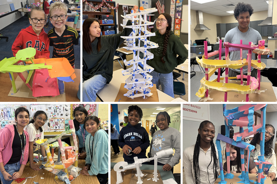 Students, showing off their ball run devices
