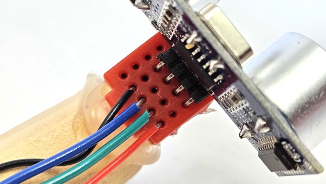 Close up view of ultrasonic sensor pins in mini breadboard