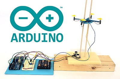 Mini popsicle stick drone on guide poles hooked up to Arduino circuit and ultrasonic sensor for altitude control