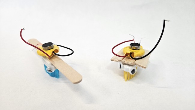 Two bristlebots with different moments of inertia
