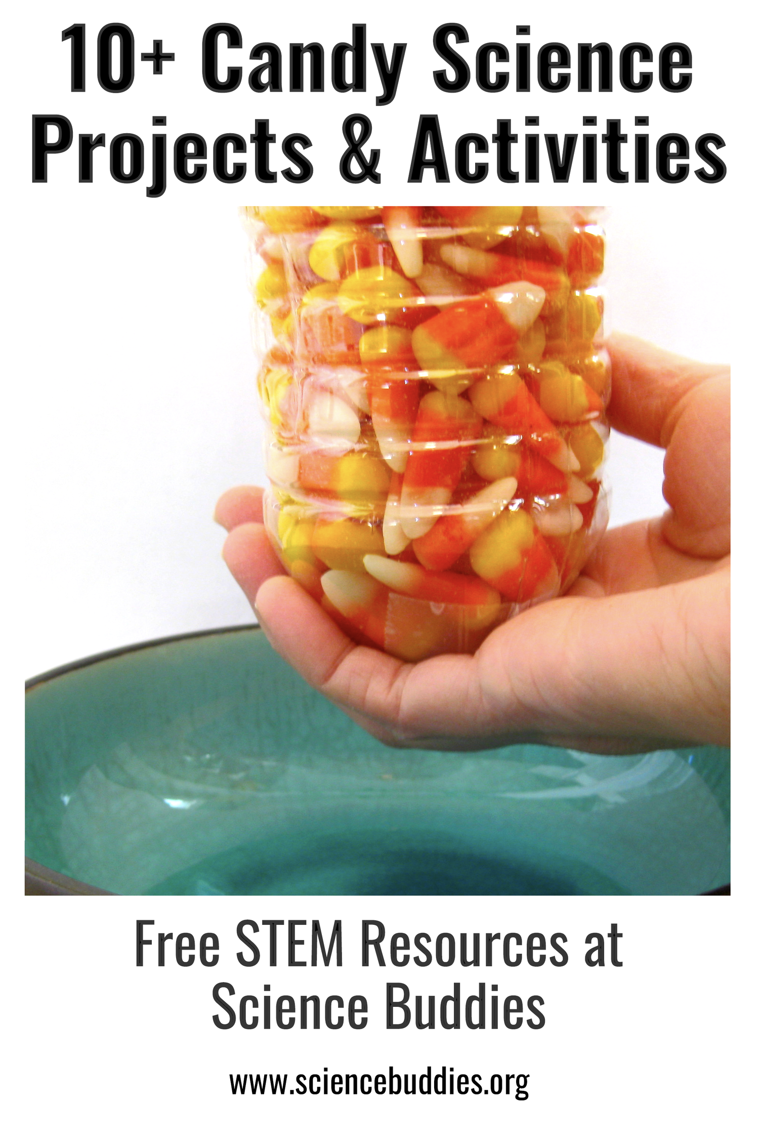 Hand under a bottle filled with candy corn candies for candy flow experiment