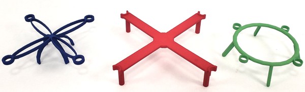 Three different 3D printed drone frames.