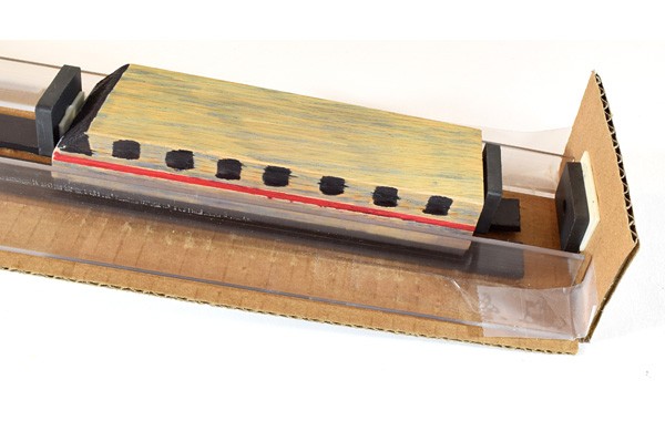 floating maglev train coming to a stop