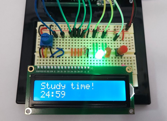 Breadboard with LCD display that says 'Study time! 24:59' 
