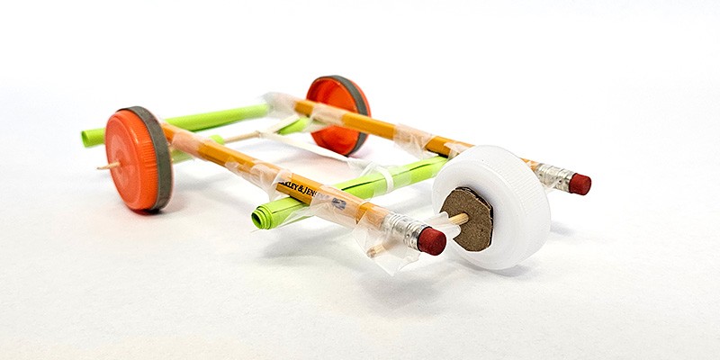 a rubber band powered car made from craft materials