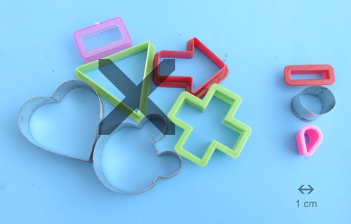 Cookie cutters larger than one centimeter across are marked with a large X
