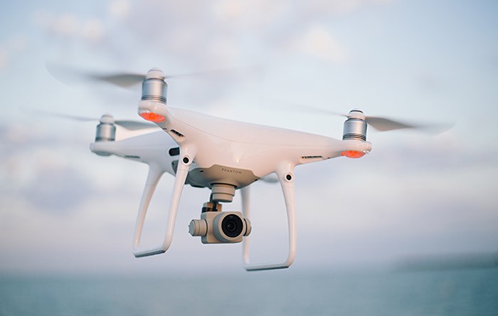 A quadcopter flying in the air.