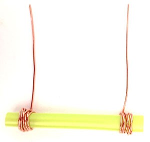 Copper wire wrapped around the ends of a plastic straw