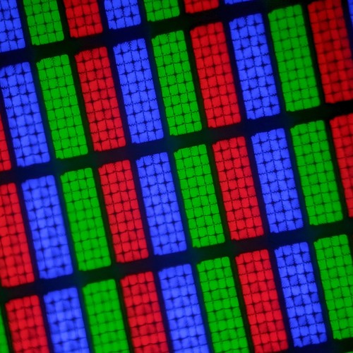 Close-up of red, green, and blue subpixels on a TV screen