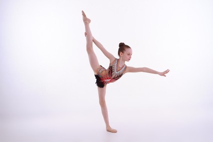 youth ballet dancer holding pose on one leg