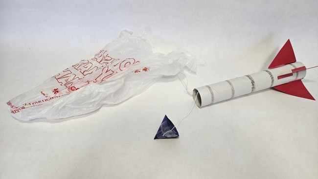 cardboard rocket with plastic bag parachute