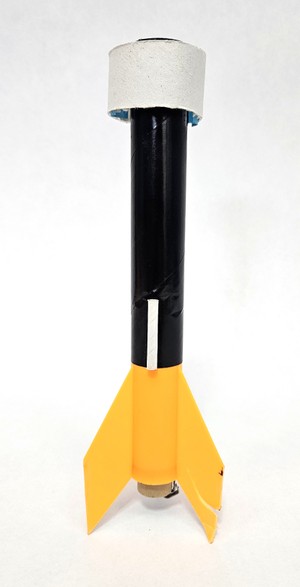 Rocket modified for vertical descent with a ring fin and smaller tail fins