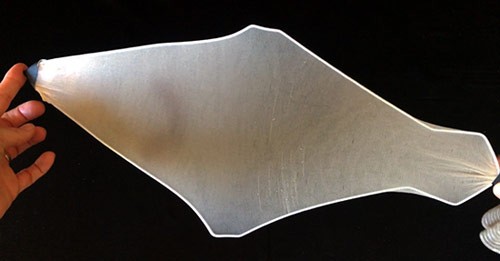 Panty hose stretched over a coat hanger that has been bent into a diamond shape.