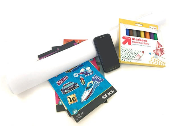 Poster sized paper, stickers, markers and a smartphone