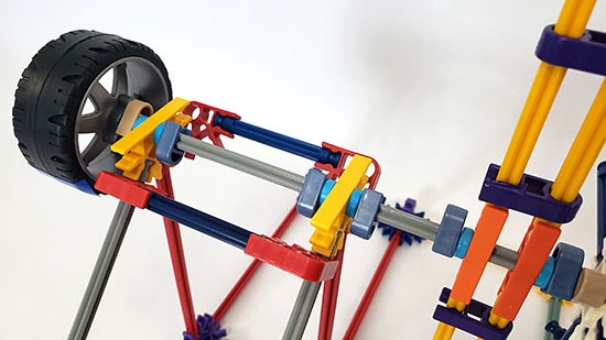Close up picture of the axle attached to the support structure.