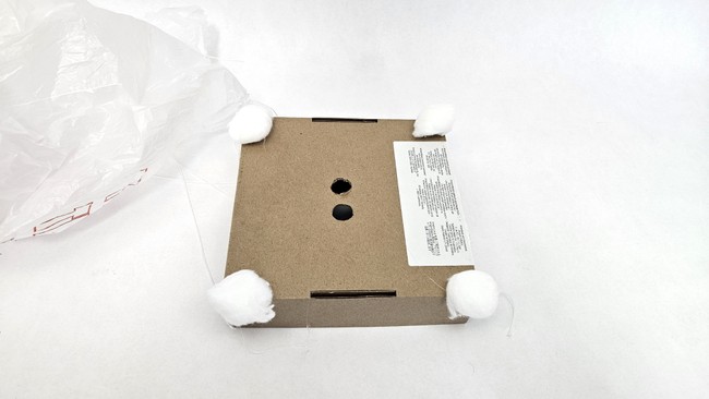 bottom view of cardboard box lander with cotton ball shock absorbers