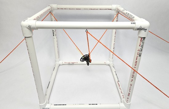 Cable-driven spacecraft motion simulator with three cables