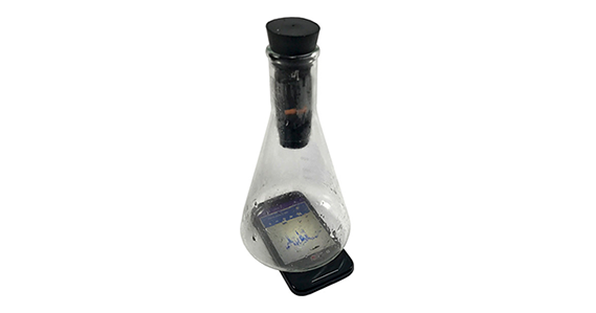 Stoppered flask model set up to experiment with what happens to sound in a vacuum