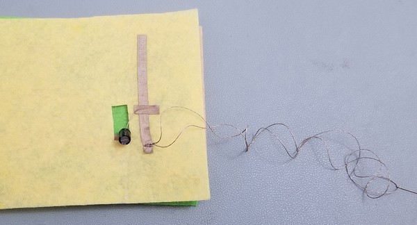 Positive 5V output from LiPo booster board to positive rail on VCC patch. 