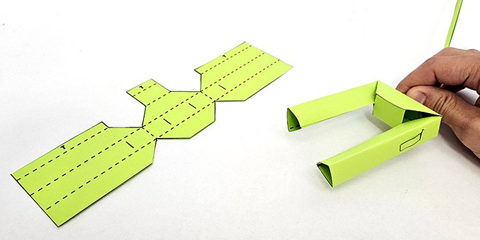 A robotic gripper made of folded paper. 