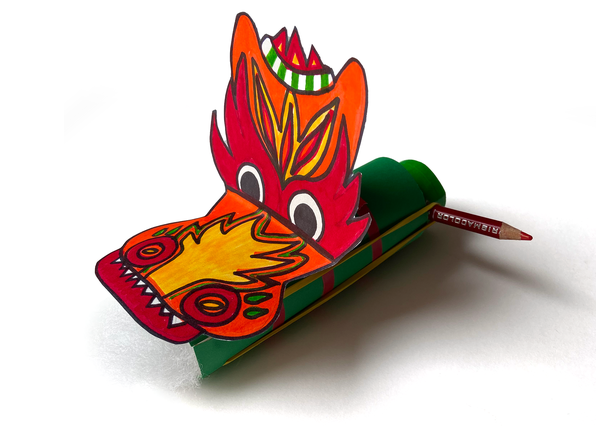 Simple launcher decorated like a dragon and made from nested cardboard tubes, rubber bands, and a pencil