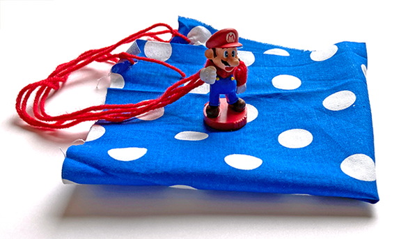 Parachute made from fabric and string with a Mario minifigure