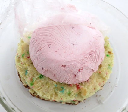 Pink ice cream on cake