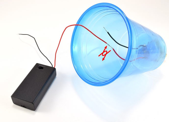 Press motor firmly onto tape.