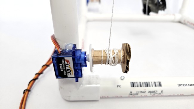 Servo glued to PVC pipe frame