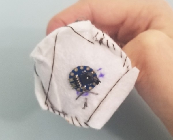 Whipstitched base of unicorn horn.