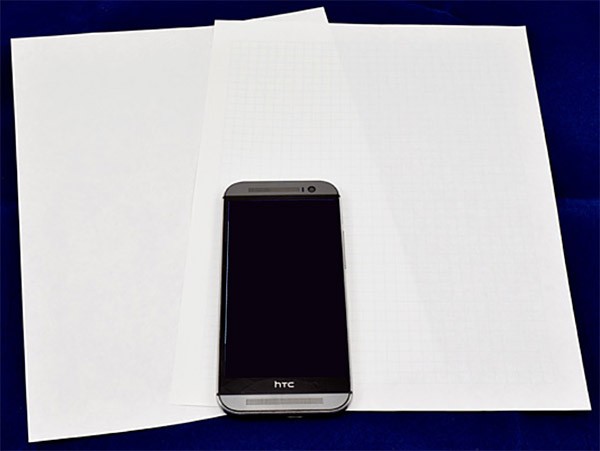 Printer paper, graph paper, and phone 