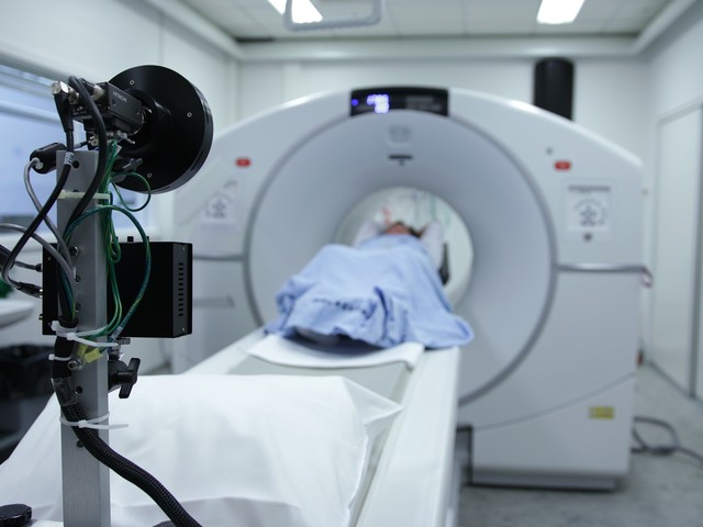 patient entering MRI machine scan