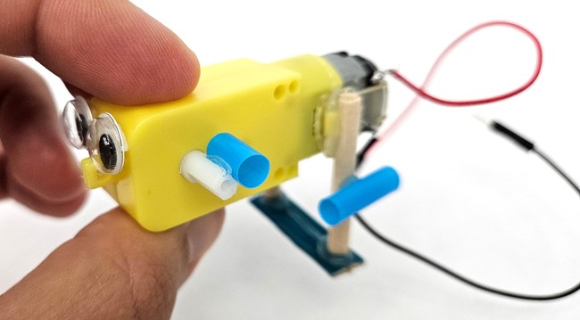 Straw glued to motor shaft 