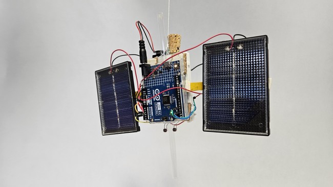 arduino satellite hanging from string