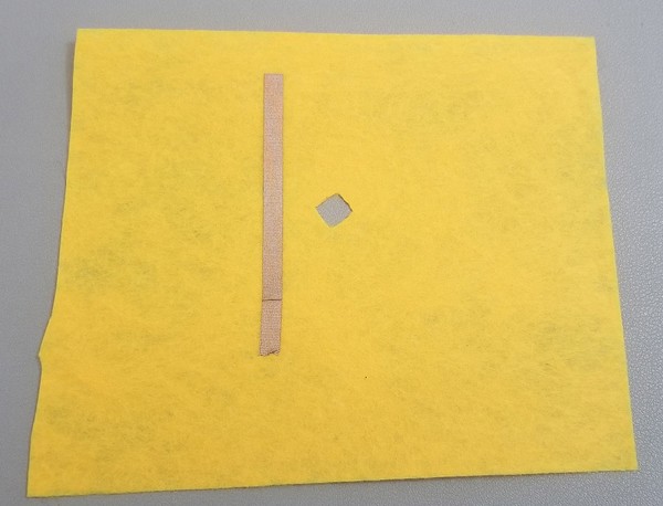 back of led patch with conductive fabric tape rail. 