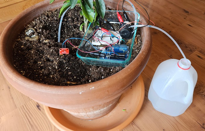 automatic watering system for indoor plant