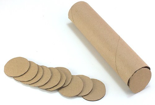 10 similar cardboard circles, they all have the same diameter as a cardboard tube.