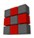 A three-by-three grid of cubes with the central edge cubes highlighted in red