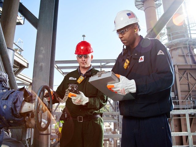 engineers inspecting machinery