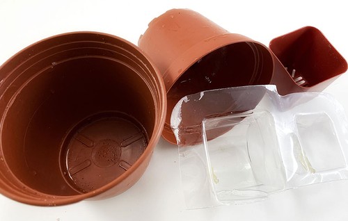Molded plastic packaging and plastic plant containers