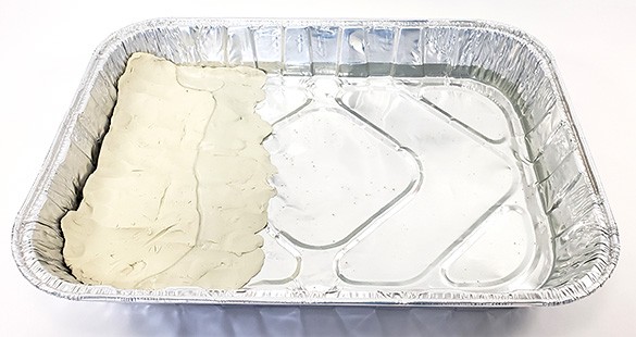  tray with water level filled halfway up the beach 