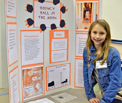 Display board for 3rd grade bouncy ball and craters science project