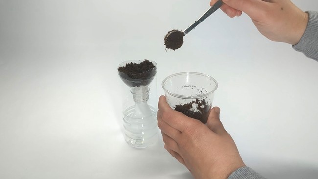 Rehydrating coconut coir.