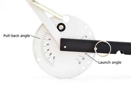 A disc connects the arm of a catapult to a base and has angles marked for a pull back angle and launch angle
