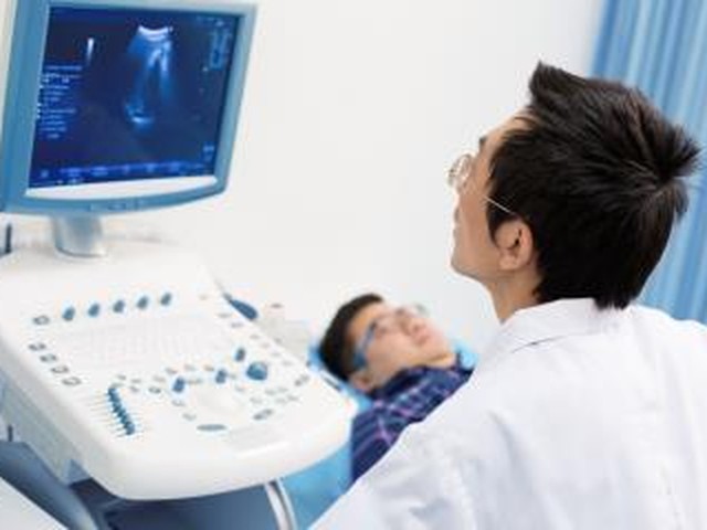 Technologist checking heart