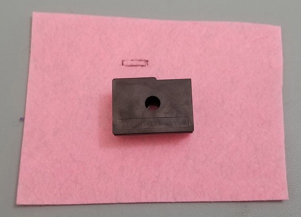 Dust sensor patch with drawn out rectangle to cut for wire. 