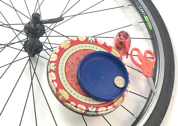 Circular objects and other materials needed to do a science and math activity on how to find Pi.