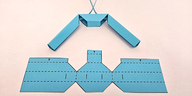 A robotic gripper made of folded paper.